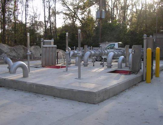 pipes and pumps at a pump station